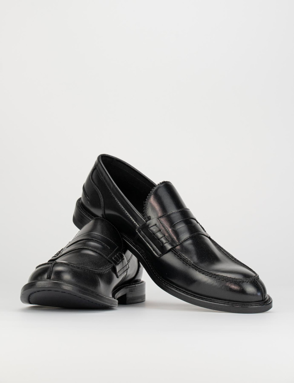 Mocasines negro cuero