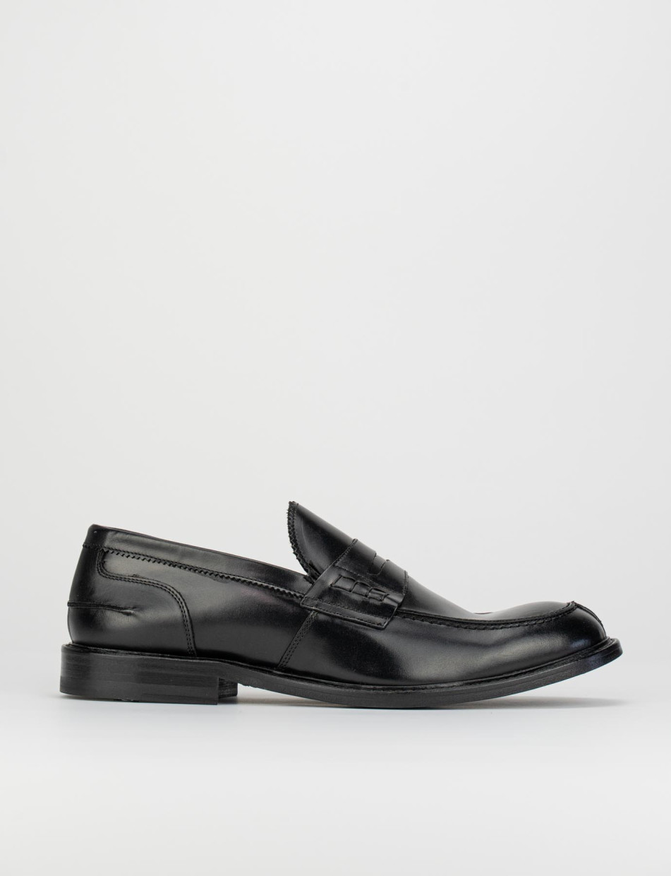 Mocasines negro cuero
