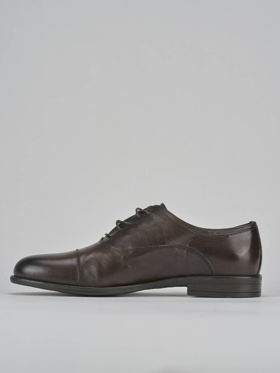 Stringate pelle testa