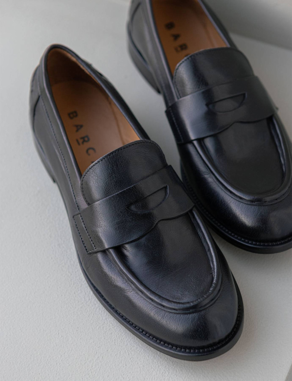 Mocasines negro cuero