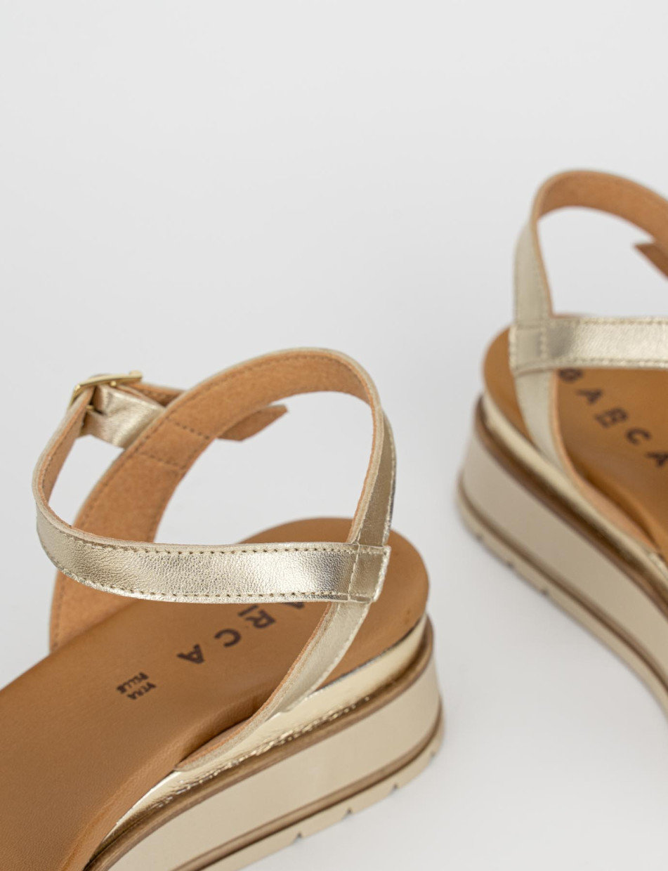 Wedge gold heels discount