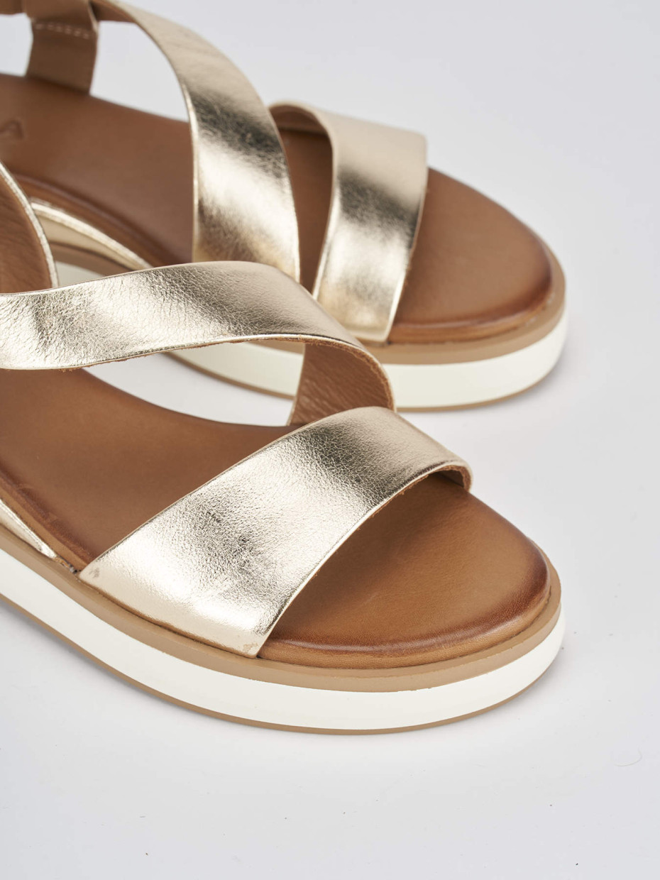Sandali oro discount con zeppa