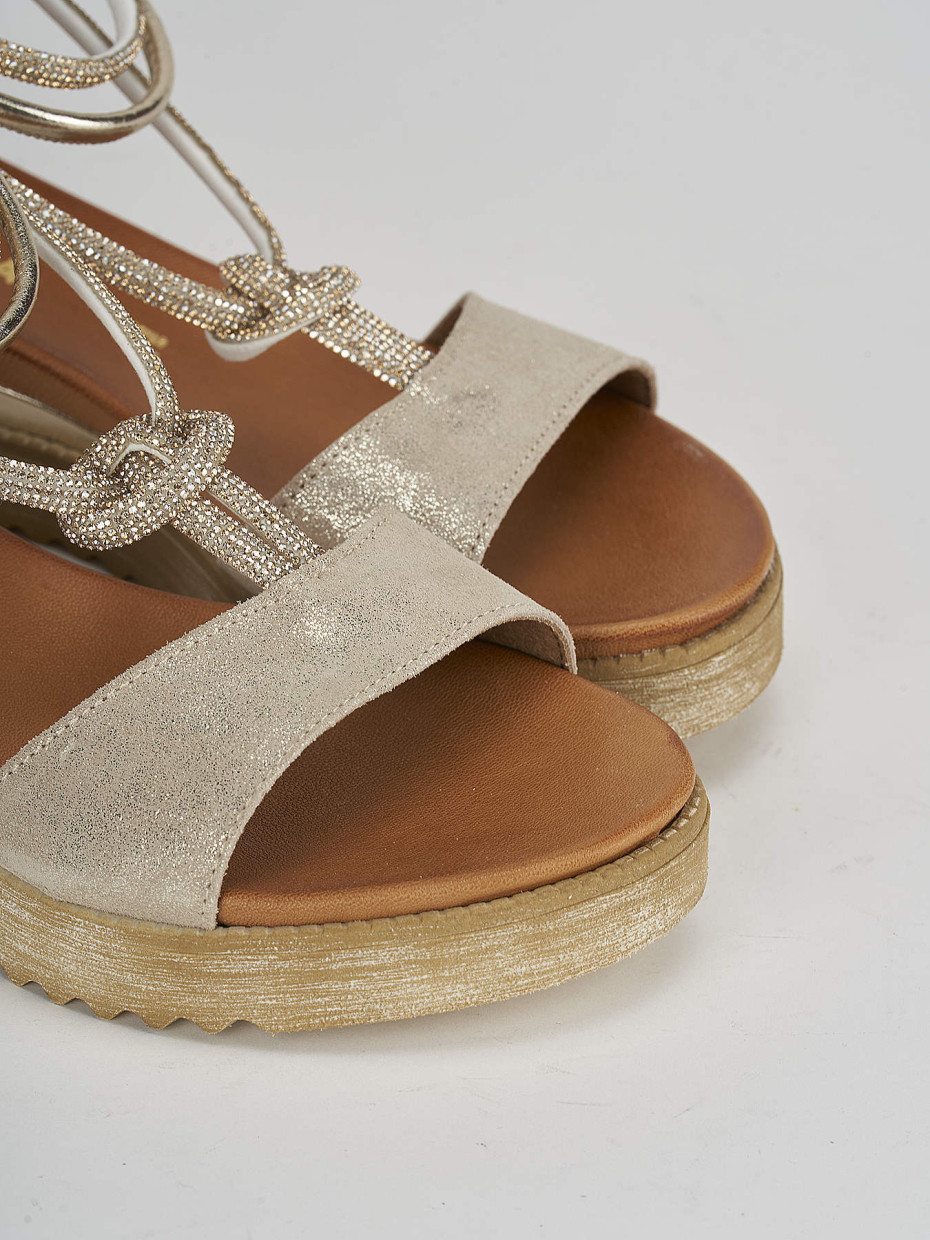 Sandali zeppa color oro top
