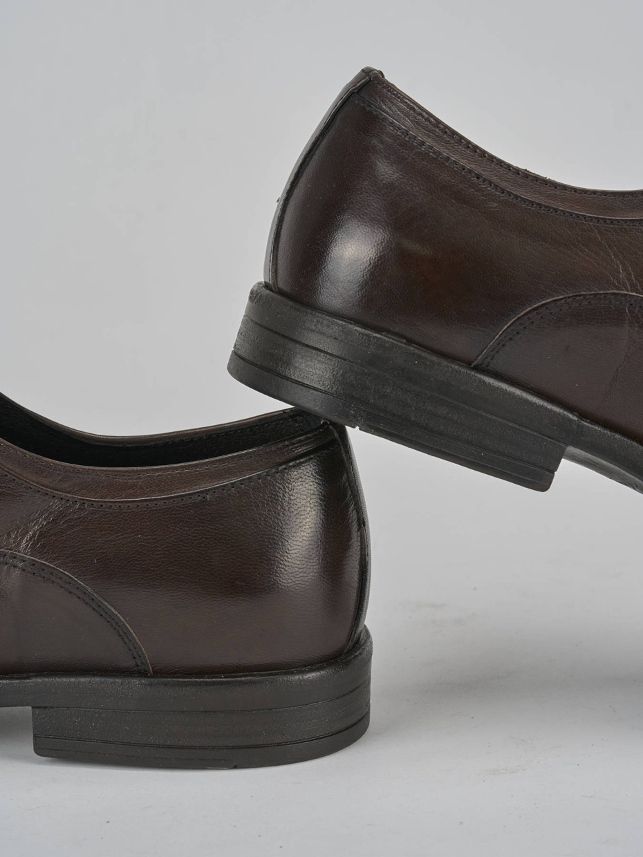 Stringate pelle testa