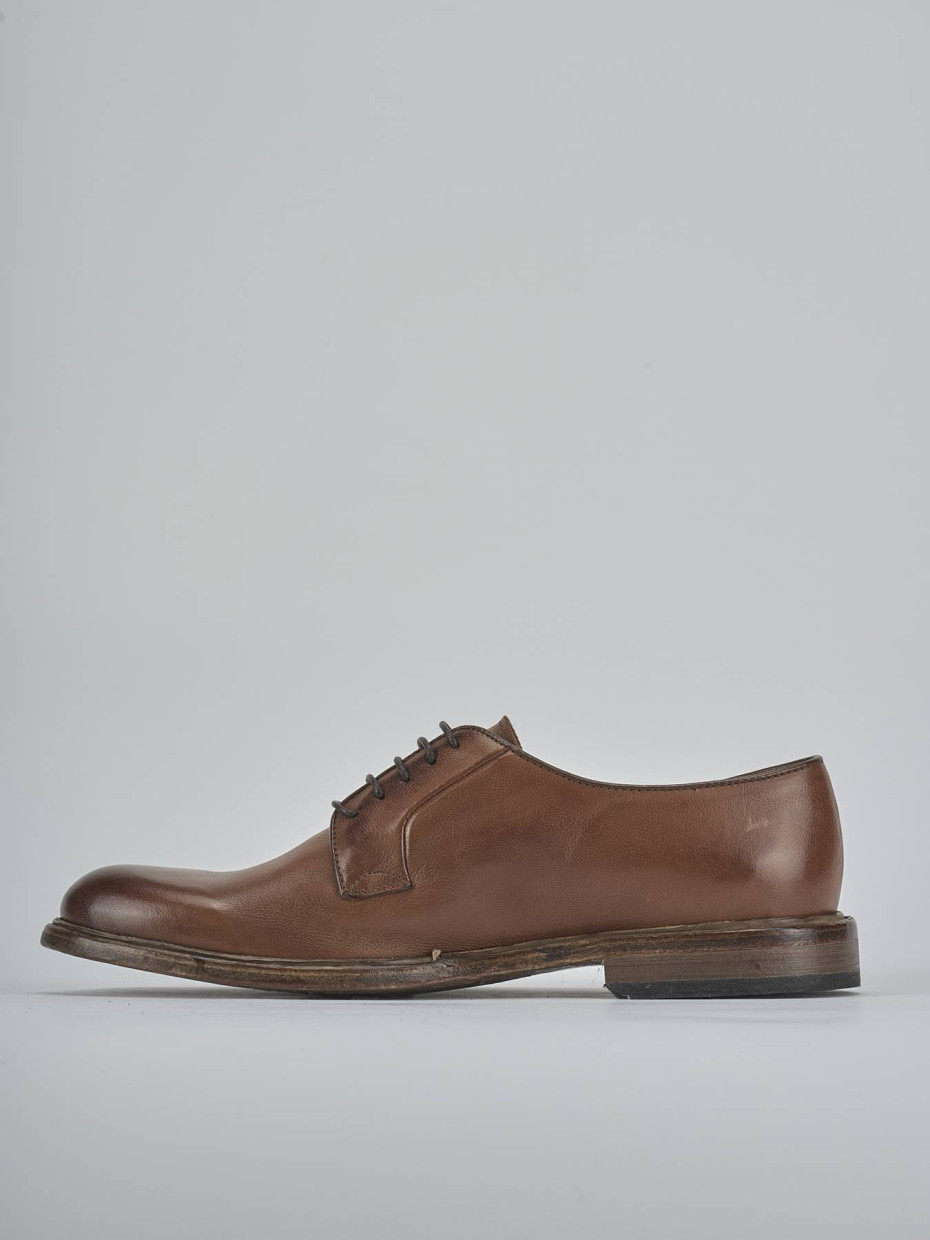 Stringate pelle testa