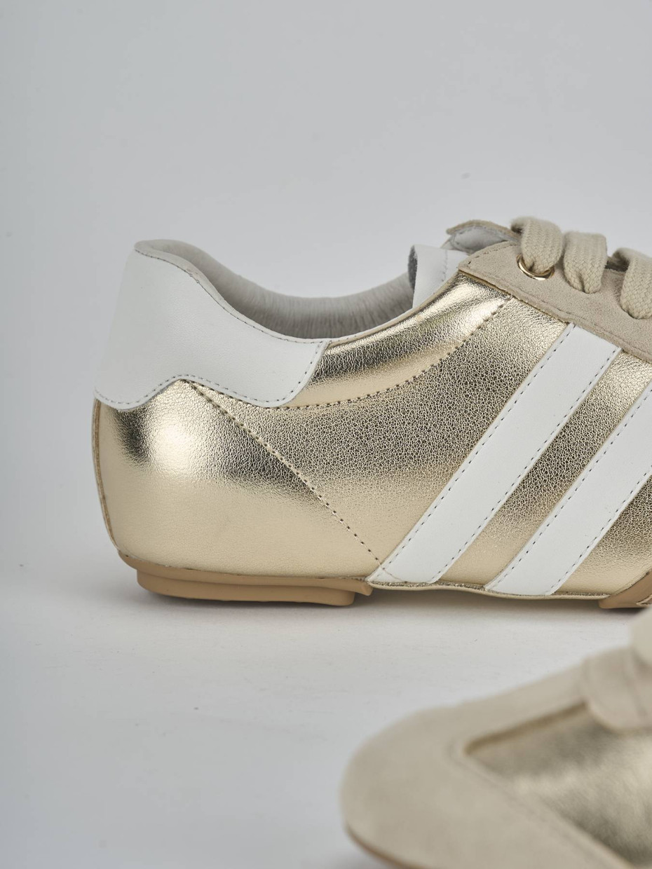Sneakers laminato oro